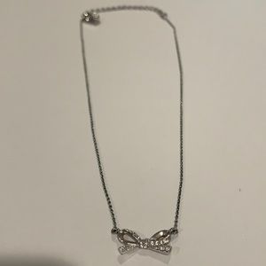 Kate Spade Bow Necklace in color: silver